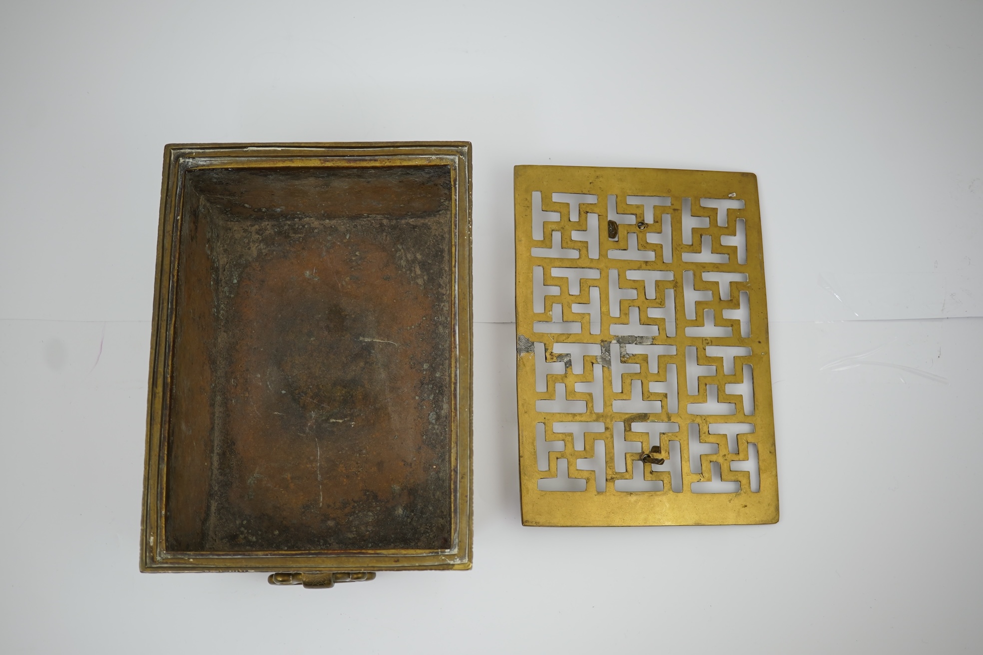A large Chinese bronze rectangular censer and cover, Xuande seal mark, and a ‘plum blossom and chilong’ bronze censer, both 19th century